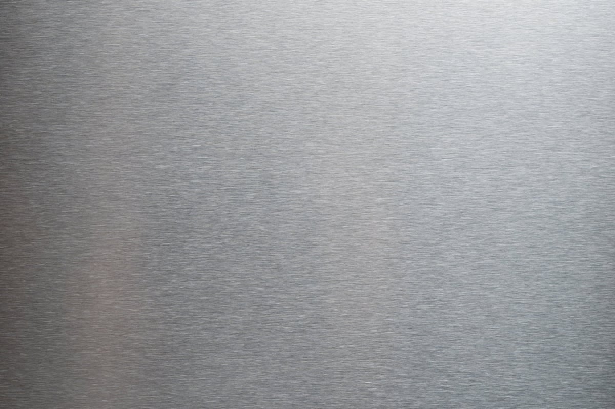 Clean steel brushed background material close up view