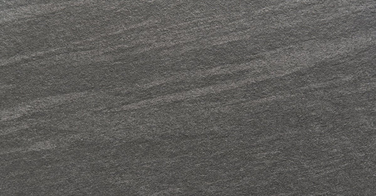 Basalt structured porcelain texture resembling volcanic rock surface