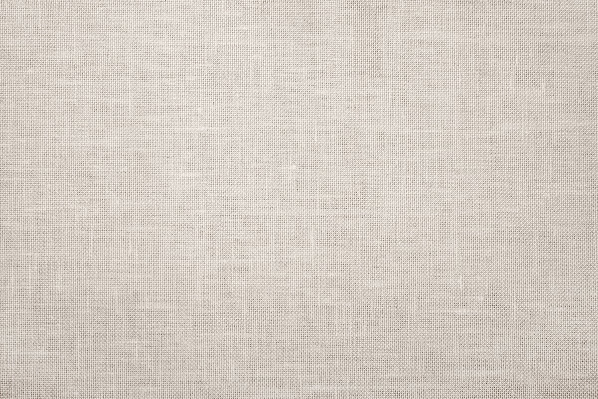 Texture of beige linen fabric.